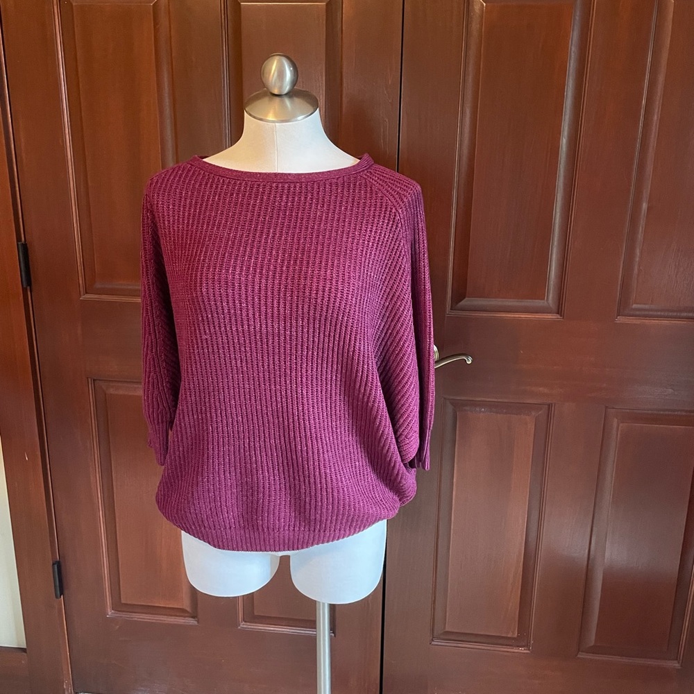 Chicos size 0 burgundy with three-quarter sleeve. Excellent condition.